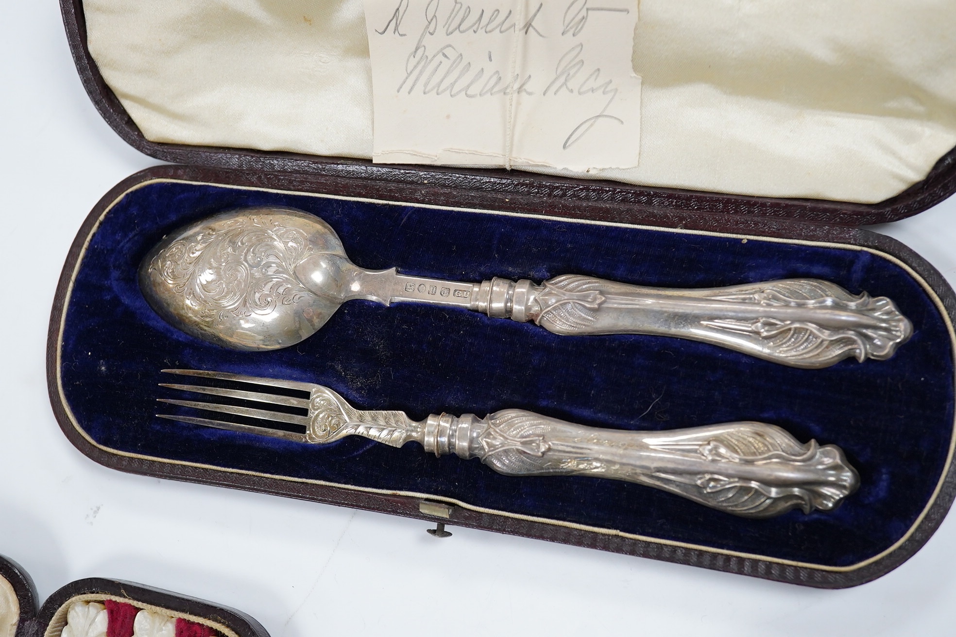 Three assorted Victorian cased silver christening sets, including London, 1880. Condition - fair.